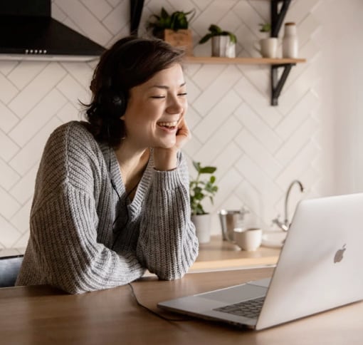 Woman engaged in a video call with headphones